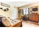 Bedroom with double bed, built-in desk, and ample closet space at 309 E Highline Cir # 101, Centennial, CO 80122