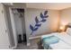 Bedroom with a closet and a king-size bed at 2200 W Moffat Pl, Denver, CO 80221