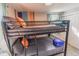 Cozy bedroom featuring a built-in bunk bed, offering sleeping space for two at 2200 W Moffat Pl, Denver, CO 80221