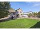 Spacious backyard featuring a deck and partial view of the house at 2118 S Truckee St, Aurora, CO 80013