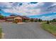 House exterior with two-car garage and gravel driveway at 1919 3Rd Ave, Longmont, CO 80501