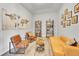 Home office with comfortable seating and built-in shelving at 18352 W 95Th Pl, Arvada, CO 80007