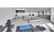 Home gym and game area with pool table and exercise equipment at 18352 W 95Th Pl, Arvada, CO 80007