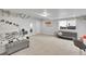 Basement bedroom with a comfy bed and sitting area at 18352 W 95Th Pl, Arvada, CO 80007