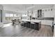 Spacious kitchen with an island, stainless steel appliances, and ample cabinetry at 18352 W 95Th Pl, Arvada, CO 80007