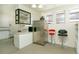Kitchen with stainless steel appliances and breakfast bar at 44 N Lincoln St, Denver, CO 80203