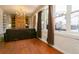 Living room with hardwood floors, large windows, and a sofa at 44 N Lincoln St, Denver, CO 80203