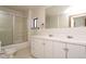 Bathroom with double vanity, shower, and toilet at 44 N Lincoln St, Denver, CO 80203