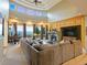 Spacious living room boasts a stunning fireplace and large windows with mountain views at 29115 Summit Ranch Dr, Golden, CO 80401