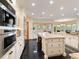 Large kitchen island, stainless steel appliances, and ample cabinet space at 29115 Summit Ranch Dr, Golden, CO 80401