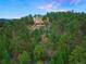 Luxury home on a hilltop with a pool and mountain views at 29115 Summit Ranch Dr, Golden, CO 80401
