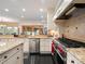 Spacious kitchen with granite countertops and stainless steel appliances at 29115 Summit Ranch Dr, Golden, CO 80401