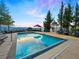Inviting pool area with gazebo and mountain backdrop at 29115 Summit Ranch Dr, Golden, CO 80401