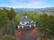 Luxury home with mountain views and a three-car garage at 29115 Summit Ranch Dr, Golden, CO 80401