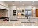 Gourmet kitchen with granite counters and stainless steel appliances at 29115 Summit Ranch Dr, Golden, CO 80401