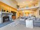 Open living area with fireplace and high ceilings at 29115 Summit Ranch Dr, Golden, CO 80401