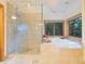 Luxurious bathroom with a walk-in shower and a large soaking tub at 29115 Summit Ranch Dr, Golden, CO 80401