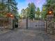 Private gated entrance to a secluded mountain home at 29115 Summit Ranch Dr, Golden, CO 80401