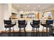 Breakfast bar with seating in a large kitchen at 29115 Summit Ranch Dr, Golden, CO 80401