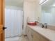 Bathroom with a shower/tub combo and double sink vanity at 29115 Summit Ranch Dr, Golden, CO 80401
