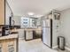 Modern kitchen with stainless steel appliances and butcher block countertops at 1155 Ash St # 202, Denver, CO 80220