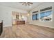 Open concept living room with kitchen and large windows at 23845 E River Front Dr, Aurora, CO 80019