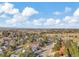 Aerial view of neighborhood with distant mountain views at 6215 Northwoods Glen Dr, Parker, CO 80134