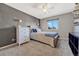 Spacious bedroom with a queen bed and a space-themed wall at 6215 Northwoods Glen Dr, Parker, CO 80134