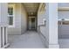 Covered front porch entrance to the home at 2385 Provenance St, Longmont, CO 80504