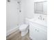 Clean bathroom with white vanity and shower at 9155 E Center Ave # 4B, Denver, CO 80247