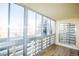 Bright sunroom showcasing expansive windows and view at 9155 E Center Ave # 4B, Denver, CO 80247