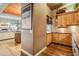 Modern kitchen with light wood cabinets and ample counter space at 9983 Heather Dr, Castle Rock, CO 80108