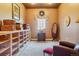Bright dressing room with ample storage and a comfortable seating area at 9983 Heather Dr, Castle Rock, CO 80108
