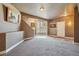 Spacious basement with large windows, entryway, and carpeted floors at 9983 Heather Dr, Castle Rock, CO 80108
