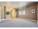 Spacious bedroom with neutral walls, carpet, and window views at 9983 Heather Dr, Castle Rock, CO 80108