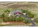 Luxury home with circular driveway, pool, and expansive grounds at 9983 Heather Dr, Castle Rock, CO 80108