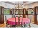 Formal dining room with a round table and chandelier at 9983 Heather Dr, Castle Rock, CO 80108