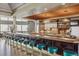 Community room with a large bar and teal stools at 9983 Heather Dr, Castle Rock, CO 80108