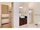 Bathroom with walk-in shower, soaking tub, and large closet at 3823 Castle Butte, Castle Rock, CO 80109