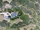 Aerial view of house and surrounding land at 3823 Castle Butte, Castle Rock, CO 80109