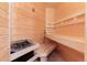 Relaxing wooden sauna with built-in bench seating at 3823 Castle Butte, Castle Rock, CO 80109