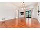 Large bedroom with hardwood floors, fireplace, and access to a deck at 3823 Castle Butte, Castle Rock, CO 80109