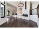 Open concept dining room with hardwood floors and a view into the kitchen at 3823 Castle Butte, Castle Rock, CO 80109
