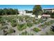 Community garden with various plots and plants at 650 S Clinton St St # 6, Denver, CO 80247