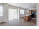 Kitchen with island, wood cabinets, and stainless steel appliances at 2381 N Elmira St, Aurora, CO 80010