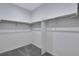 Large walk-in closet with double hanging rods at 13521 E 99Th Pl, Commerce City, CO 80022