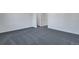 Simple bedroom with carpet flooring and lots of natural light at 13521 E 99Th Pl, Commerce City, CO 80022