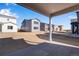 View from covered patio shows homes and landscaping at 13521 E 99Th Pl, Commerce City, CO 80022