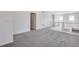 Upper level hallway with carpet, access to bedrooms and bathroom at 13521 E 99Th Pl, Commerce City, CO 80022