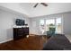 Main bedroom with hardwood floors, a bay window, and a dresser at 1027 Southbury Pl, Highlands Ranch, CO 80129